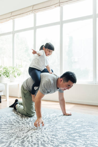 istock Asian father and daughter are playing games 1246864481