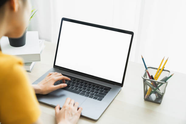 istock Woman hand using laptop and type on the keyboard. Mockup screen of advertisement. 1246864496