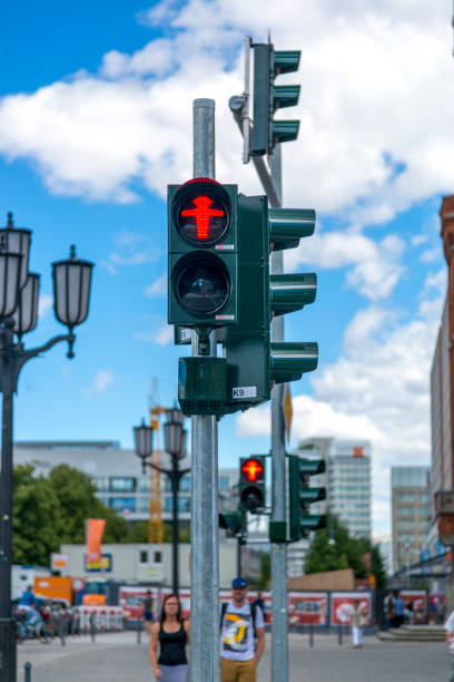 Ampelmann is the symbol shown on pedestrian signals in Germany Berlin, Germany - July 01, 2018: Ampelmann is the symbol shown on pedestrian signals in Germany ampelmännchen photos stock pictures, royalty-free photos & images