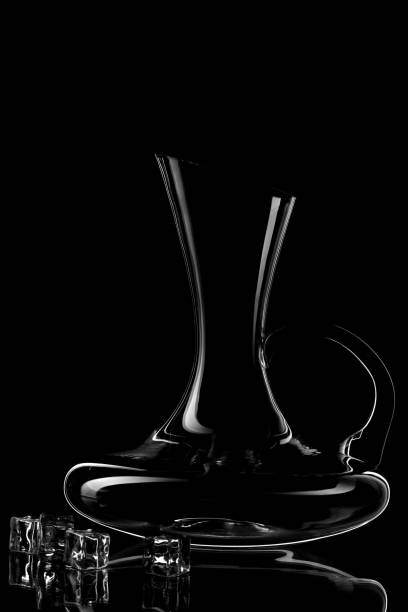 istock Glass wine decanter with black background 1246905754