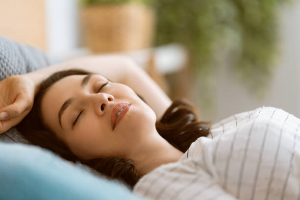 istock woman is sleeping in the bedroom 1246905818