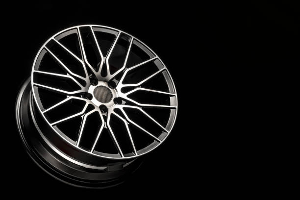black alloy wheels, aluminum disc sport with a carbon fiber cover. Light weight and modern cool design. copy space maket stock photo