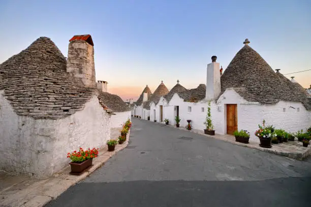 Trulli houses in Alberobello town. A trullo is a traditional Apulian dry stone hut with a conical roof.