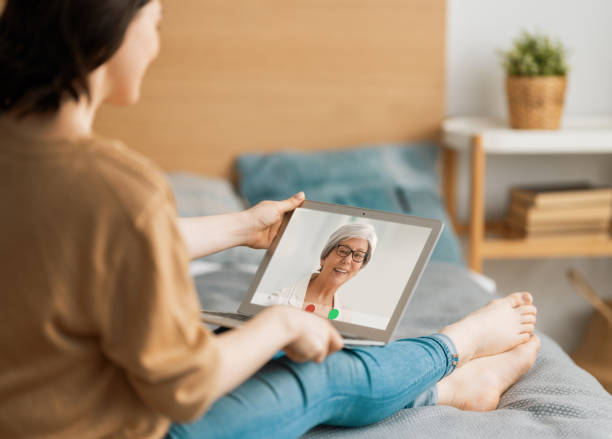 istock Young woman is chatting with mother. 1246909198