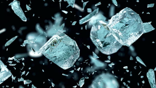 Crushing frosted ice cubes in 4K Slow motion