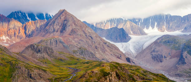 istock Mountain view. Morning light on the colored rocky slopes. 1246910225