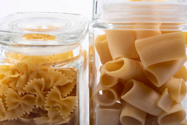 istock Pasta inventory..pasta in storage bottles. Backlit. 1246912172
