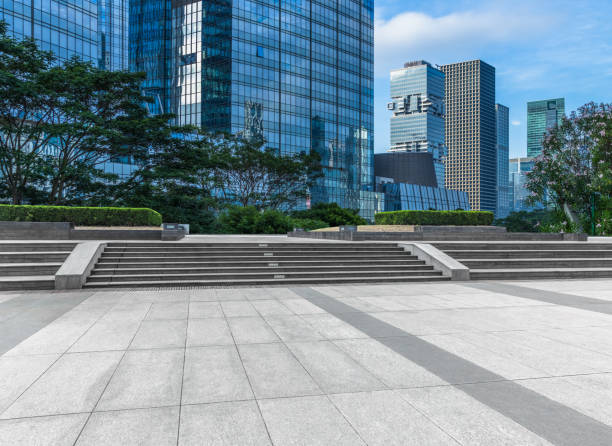 istock empty pavement and modern buildings in city 1246912948