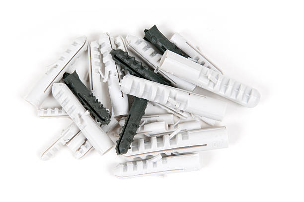 Heap of a plastic dowels stock photo