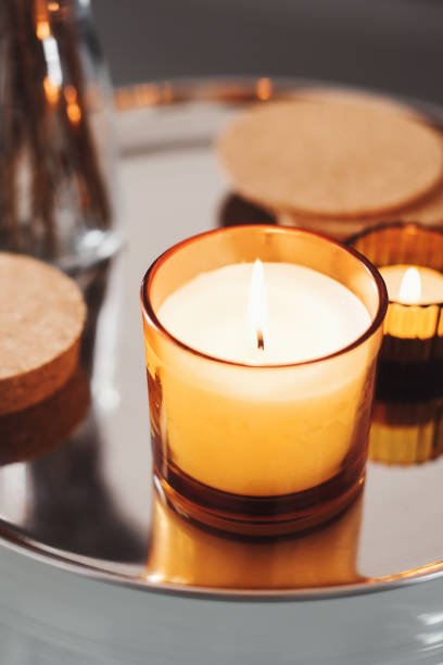 istock Aroma candle with ginger scent on a metal tray. Aromatherapy concept. Home decor 1246916588