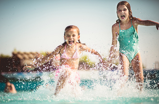 Summer with friend. Children in water.