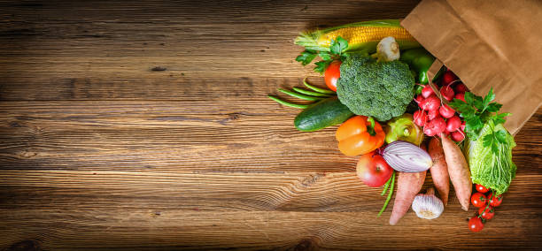 istock Composition with assorted raw organic fresh vegetables. Assortment of fruits and vegetable. 1246919694