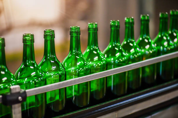 istock Bottling and conveyor line or belt at winery factory, 1246919705