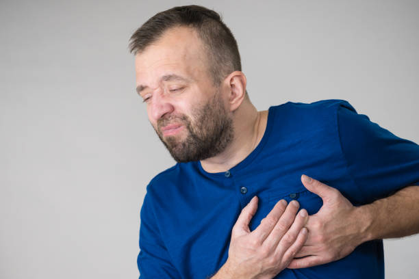 istock Man having heart pain attack 1246921538