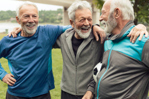 istock Three senior men getting ready for soccer together taking a break 1246927275