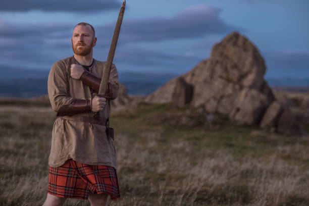 istock Scottish Redhead Warrior wearing a kilt 1246930422
