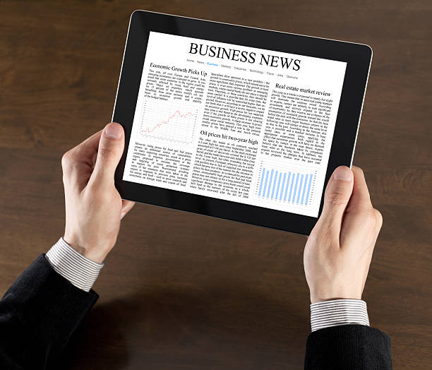 istock Business News On Tablet PC 124694037