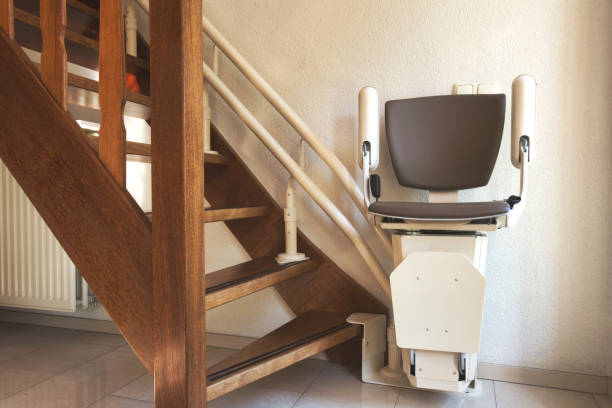 istock Automatic stairlift on staircase for elderly or disability in a house, 1246942913