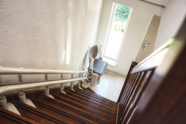 istock Automatic stairlift on staircase for elderly or disability in a house, 1246943455