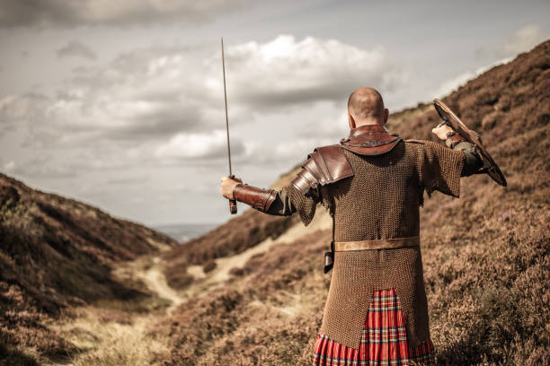 istock Scottish Redhead Warrior wearing a kilt 1246944593