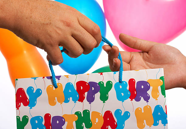 istock Giving A Birthday Gift Or Present 124694647