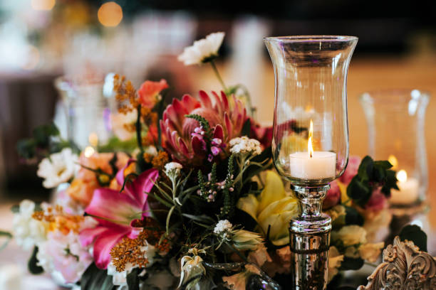 istock Beautiful, decorated table with flower decorations and burning candle.  Wedding or party decorations. 1246948183