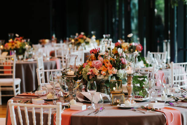 istock Beautiful, decorated table with flower decorations.  Wedding or party decorations. 1246948217