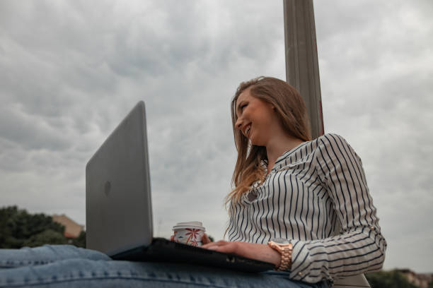 istock Girl working outdoors 1246955108