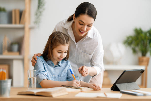 istock Girl doing homework or online education. 1246966409