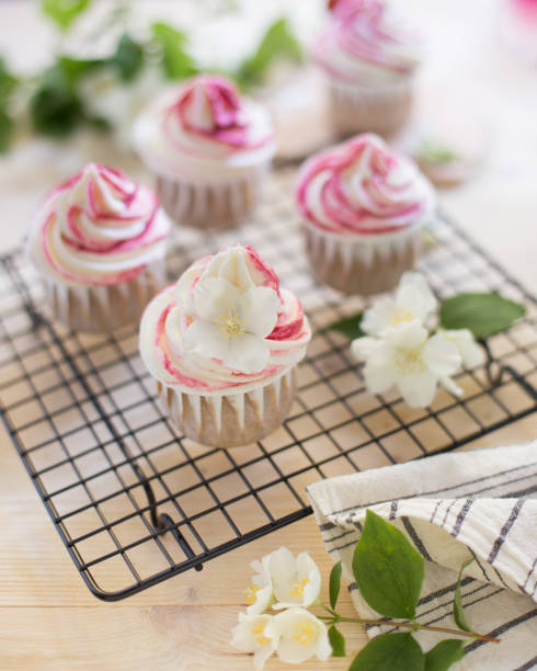 istock Composition with tasty cupcakes on wood table. 1246974307