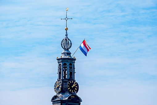 The Munt Tower in Amsterdam the Netherlands at kings day
