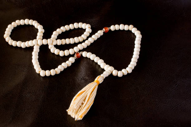 istock Tibetan Buddhist rosary, called mala or japamala 1246979920
