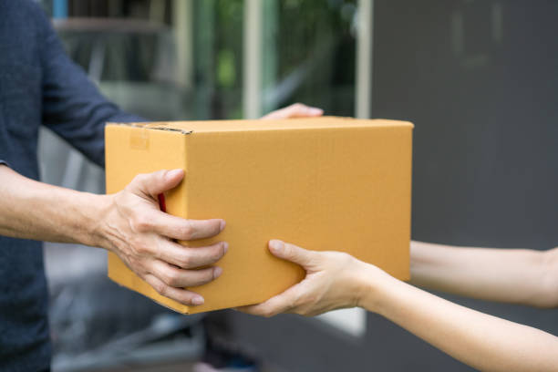 istock Safety mail goods delivering during epidemic. 
Online shopping order under quarantine coronavirus covid-19. 1246980007