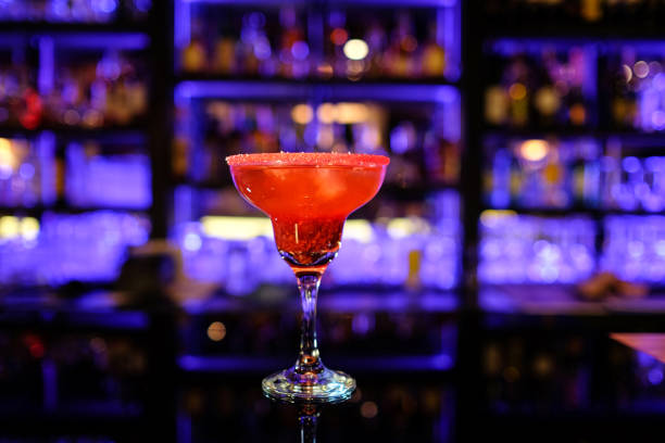 istock alcohol coctail on the bar focus on foreground with fruit 1246980392