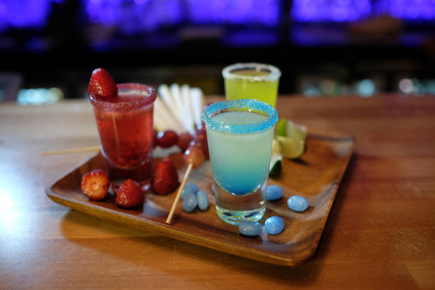 istock alcohol coctail on the bar focus on foreground with fruit 1246981948