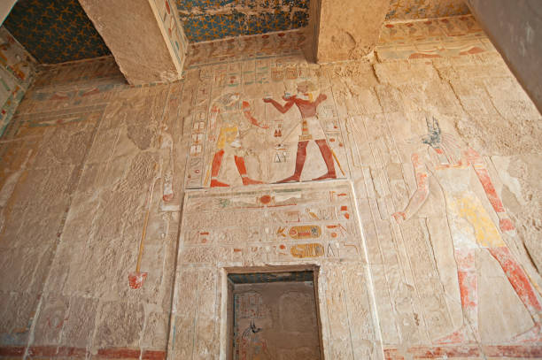 istock Hieroglyphic carvings on an ancient egyptian temple wall 1246996558