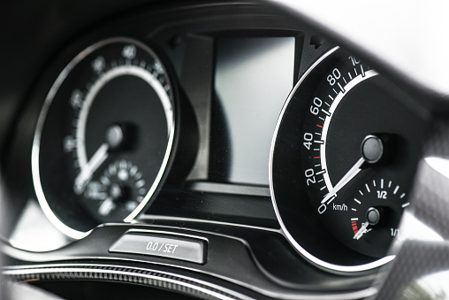 Speed Tachometer or gauge in modern car. Control vehicle dashboard detail.