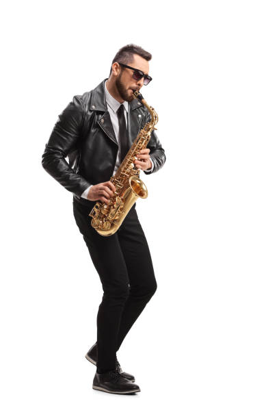 istock Man in a leather jacket playing a saxophone 1247003993