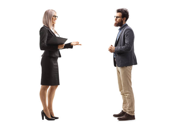 istock Bearded man and a businesswoman talking 1247004218