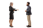 Bearded man and a businesswoman talking