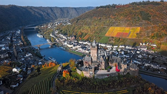 Cochem, Germany: Aerial panorama of Cochem resort town,  Cochem castle and Vineyards in Mosel wine valley at autumn, Rhineland-Palatinate, Germany.