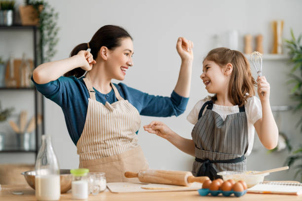 istock family are preparing bakery together 1247005229