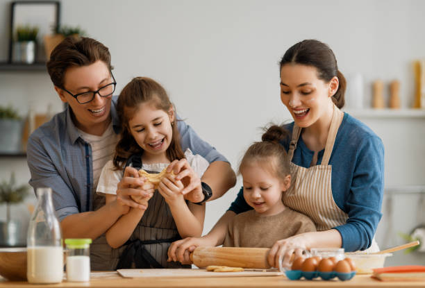 istock family are preparing bakery together 1247005241