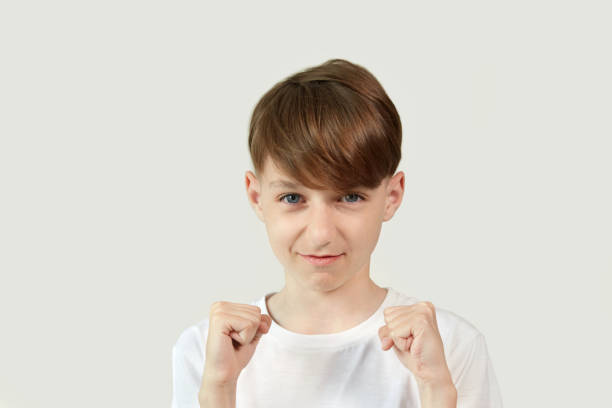 istock The guy in the white jersey is ready for battle and put his fists forward. 1247006520