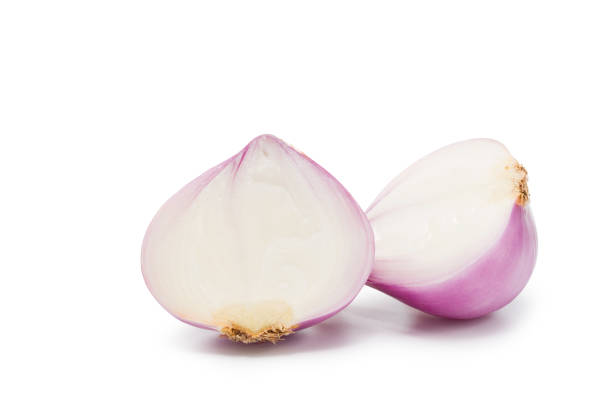 istock Indian shallots cut into pieces isolated on white. Clipping path. 1247012670