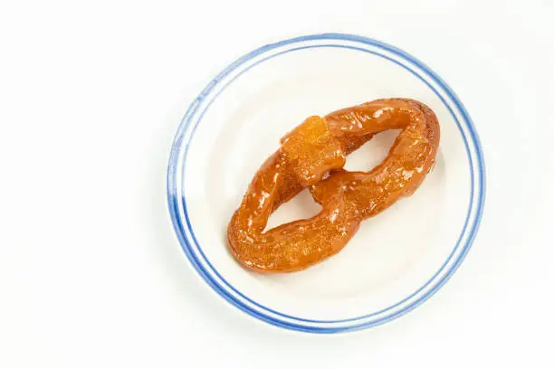 Old Beijing Halal Snack Ear-shaped twists(Tang erduo) with Sugar on White Background