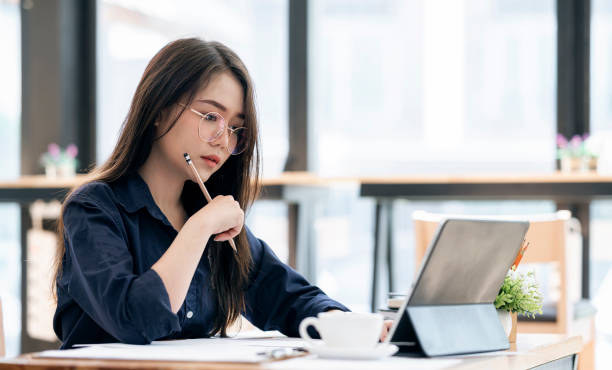istock Young businesswoman working at co-workspace. 1247044807