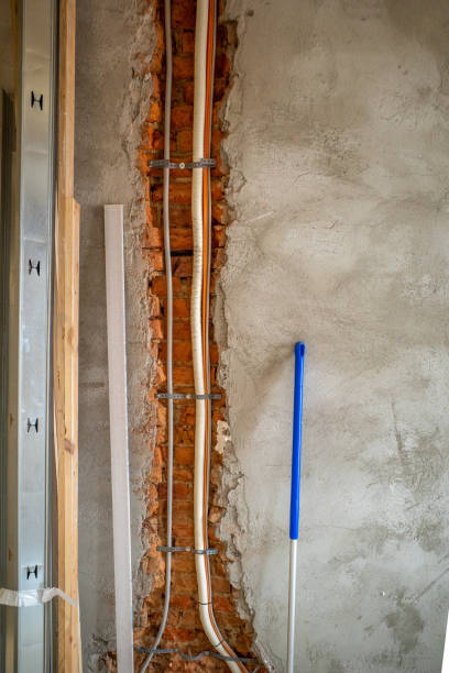 istock some new cables and pipes are laid in an old building 1247048364