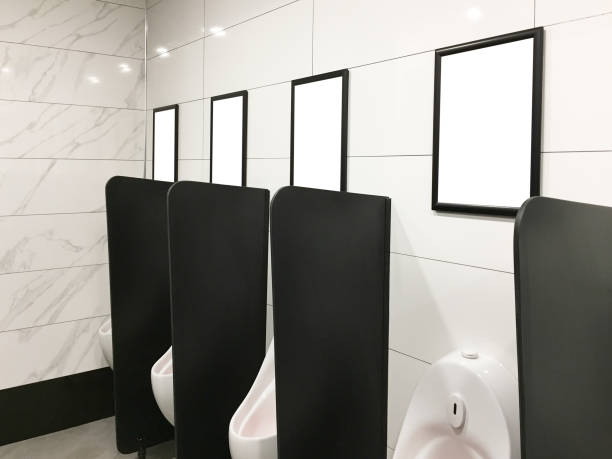 public restroom, toilet, urinals with blank billboards (clipping path) - urinal clean contemporary in a row imagens e fotografias de stock
