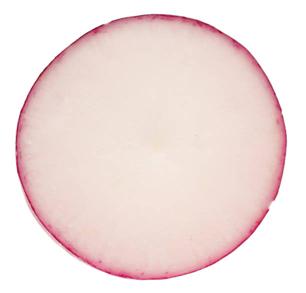 istock Slice of radish isolated on white background 1247066121